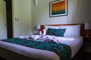 Palm City Resort - Zimmer mit Bett